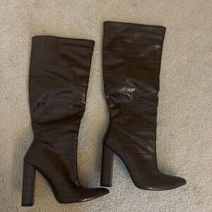 Brown tall boots with pointed toe